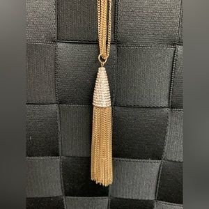 Costume gold long tassel necklace.
